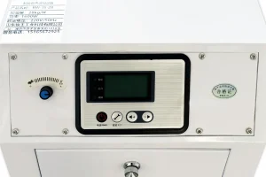 Display and control panel of a commercial ultrasonic humidifier, featuring a digital screen with buttons for operation.