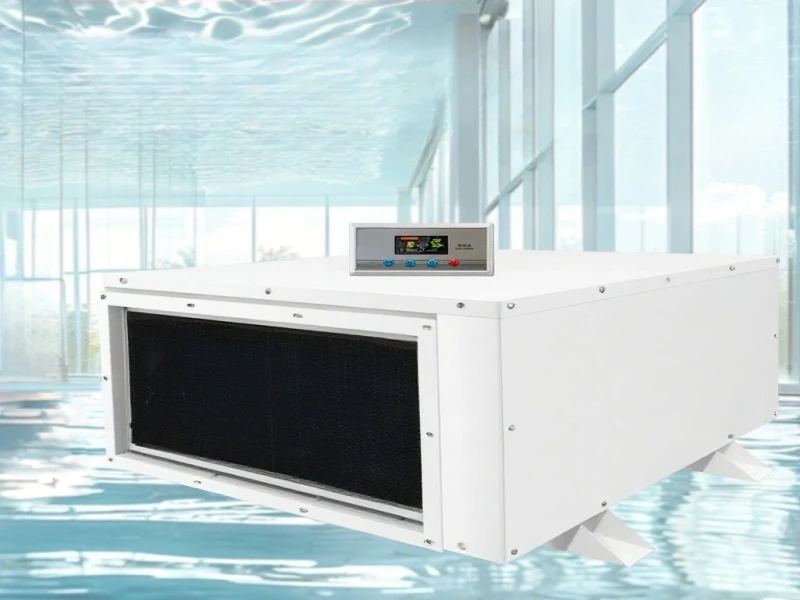 Industrial dehumidifier for swimming pool, shown with a digital display against a pool background.