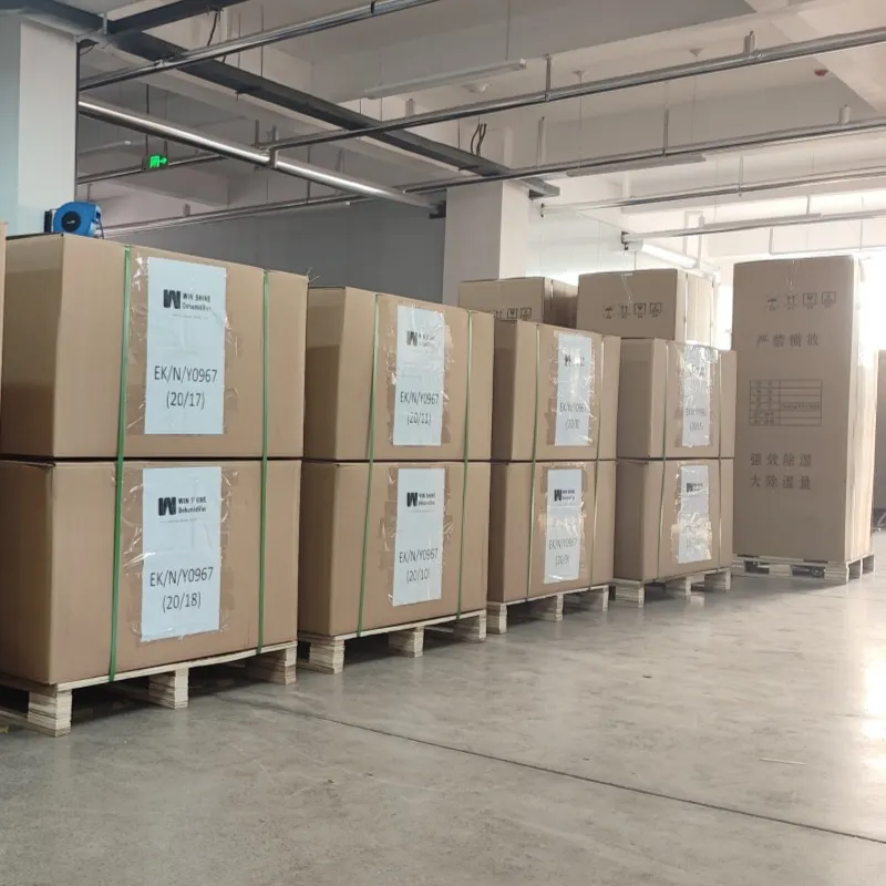 Multiple stacked cardboard boxes on wooden pallets in the Ruiwang Warehouse.