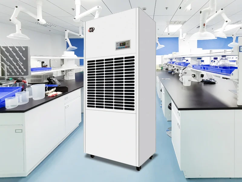 A white industrial dehumidifier in a clean laboratory, ideal for pharmaceuticals production.