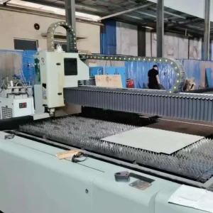A production workshop where workers are assembling HVAC units.