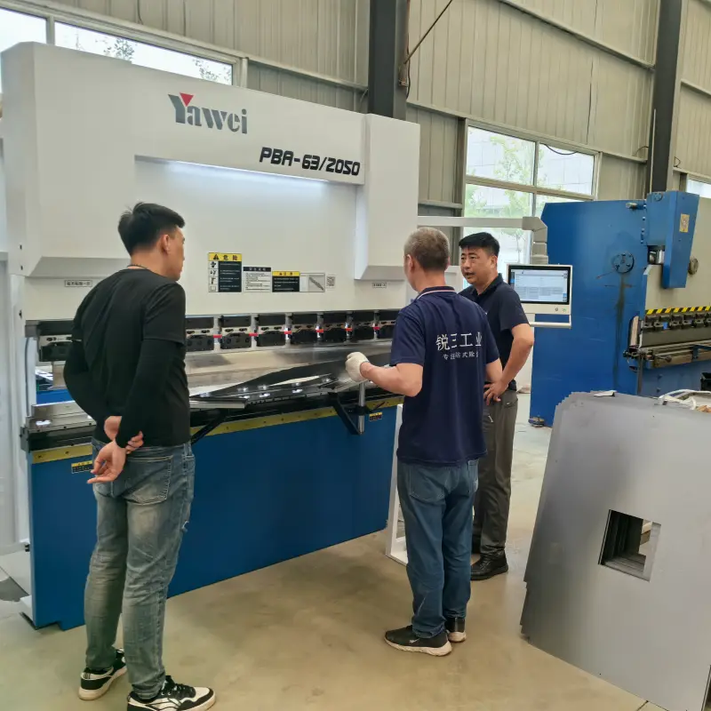 Factory workers performing Sheet Metal Bending for dehumidifier manufacturing