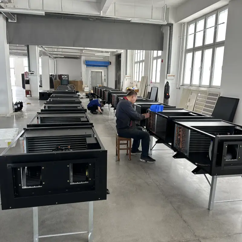 Production process using a CNC laser cutting machine in a factory.